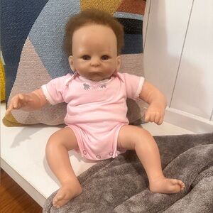 Charming Baby Doll in Pink Outfit